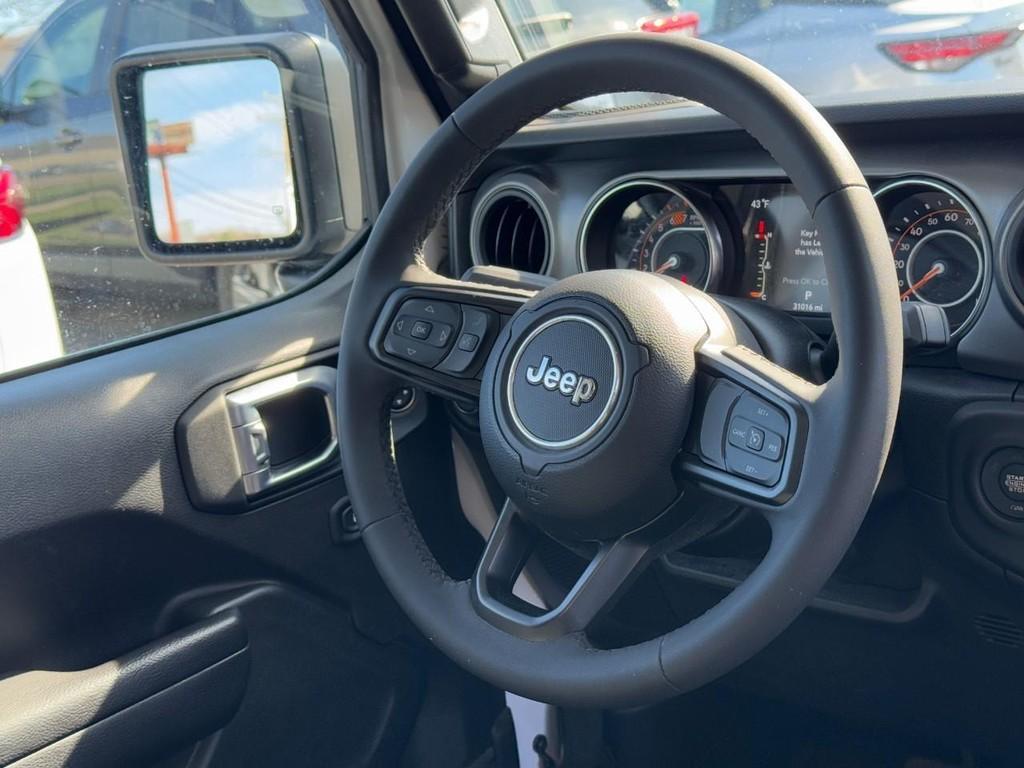 used 2023 Jeep Wrangler car, priced at $26,225