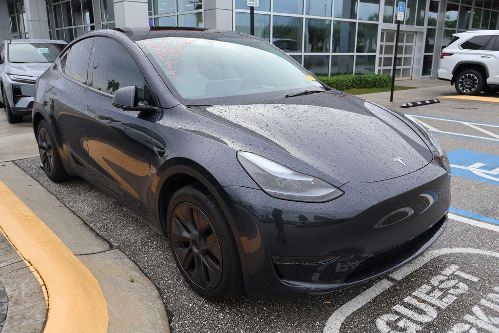 used 2025 Tesla Model Y car, priced at $38,868