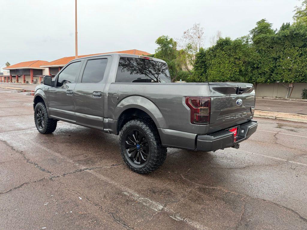 used 2018 Ford F-150 car, priced at $26,900