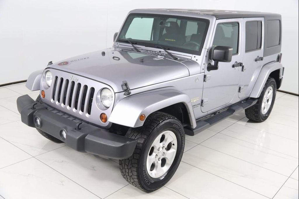 used 2013 Jeep Wrangler Unlimited car, priced at $13,990