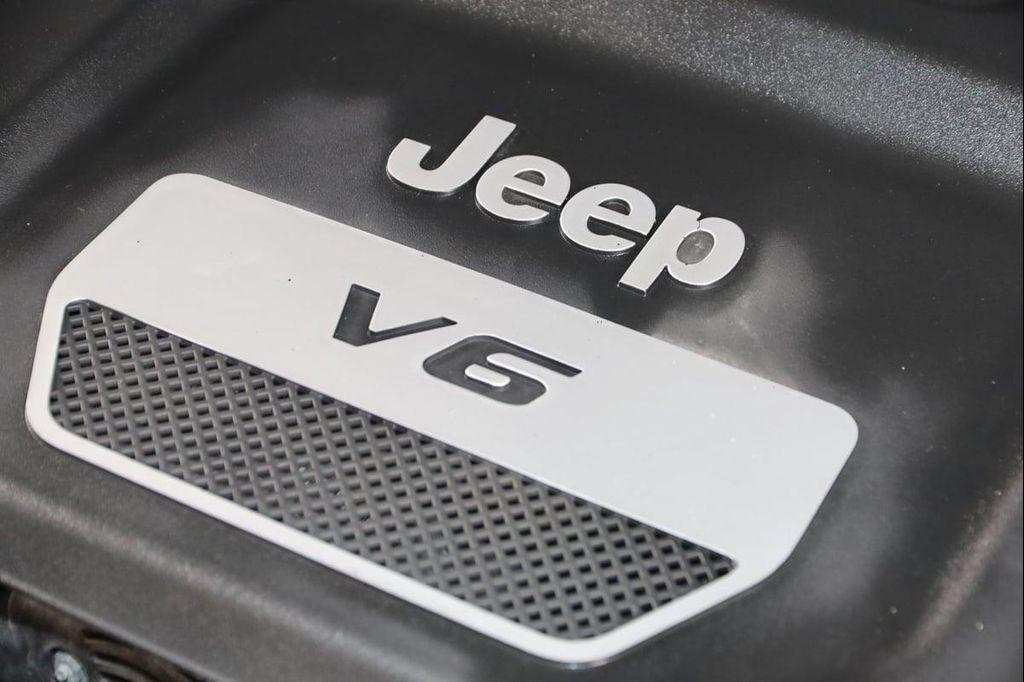 used 2013 Jeep Wrangler Unlimited car, priced at $13,990