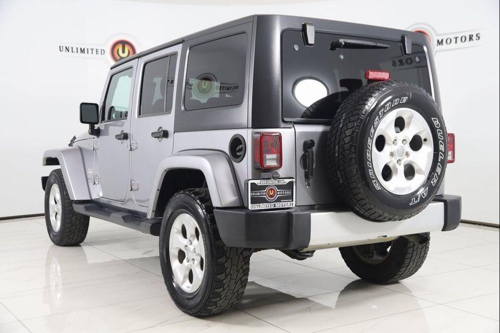 used 2013 Jeep Wrangler Unlimited car, priced at $13,990