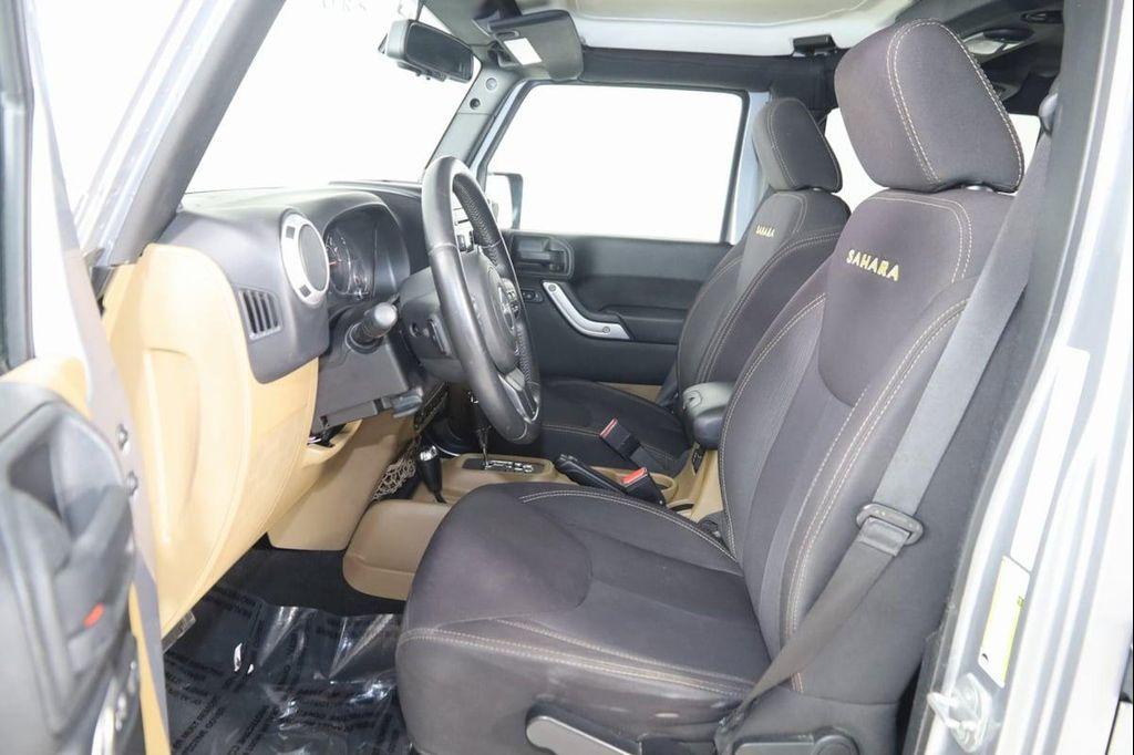 used 2013 Jeep Wrangler Unlimited car, priced at $13,990