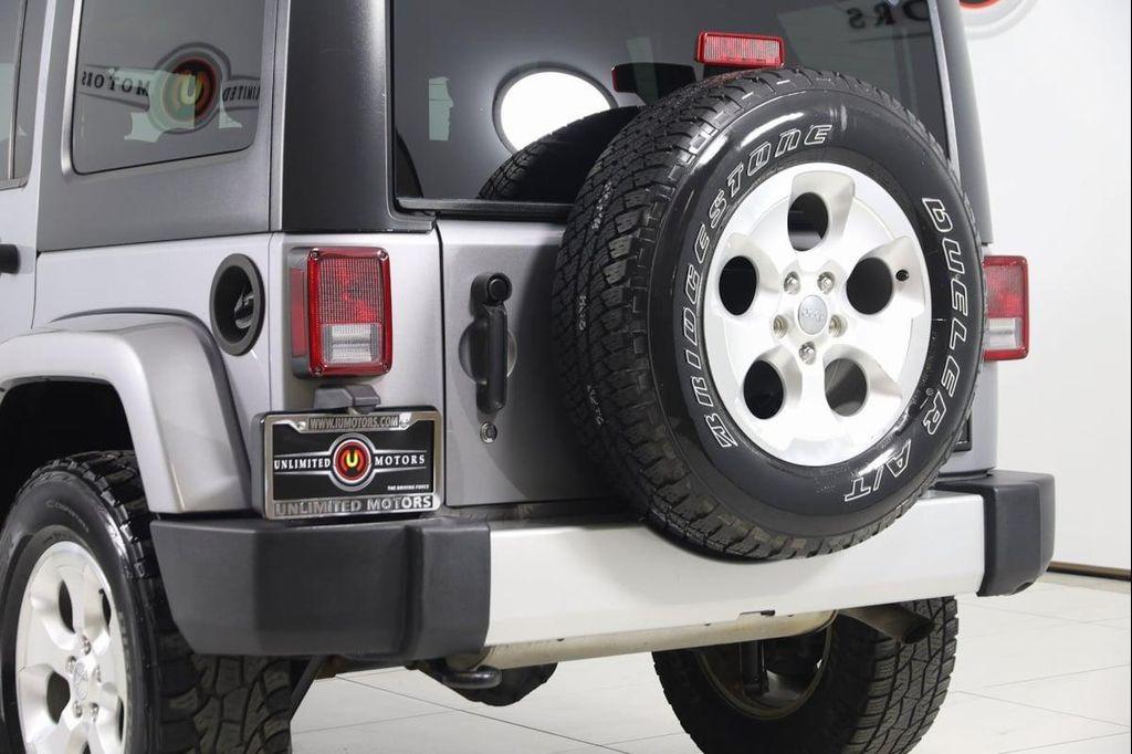 used 2013 Jeep Wrangler Unlimited car, priced at $13,990