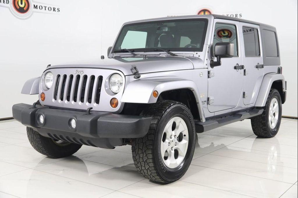 used 2013 Jeep Wrangler Unlimited car, priced at $13,990