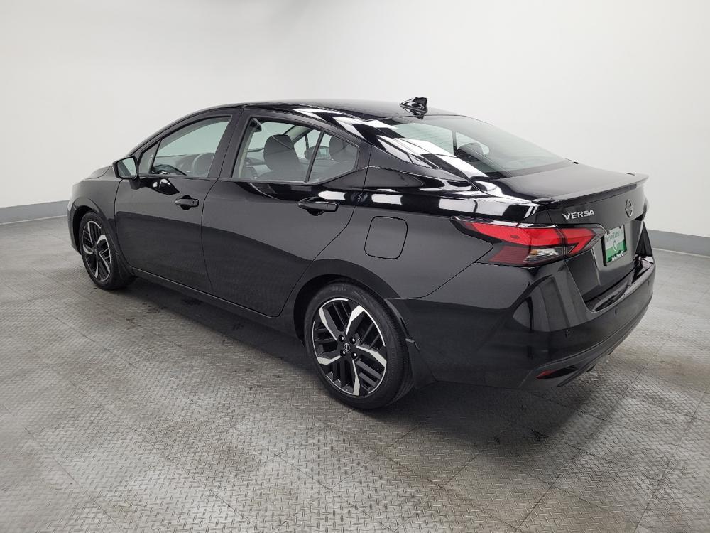 used 2024 Nissan Versa car, priced at $18,595