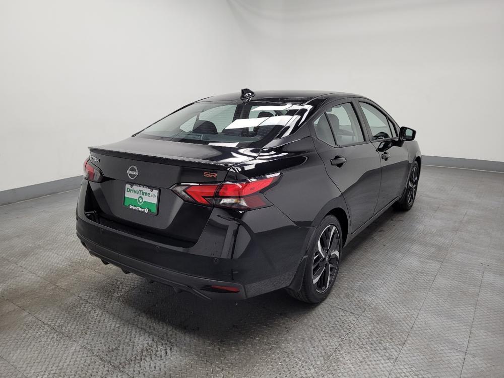 used 2024 Nissan Versa car, priced at $18,595