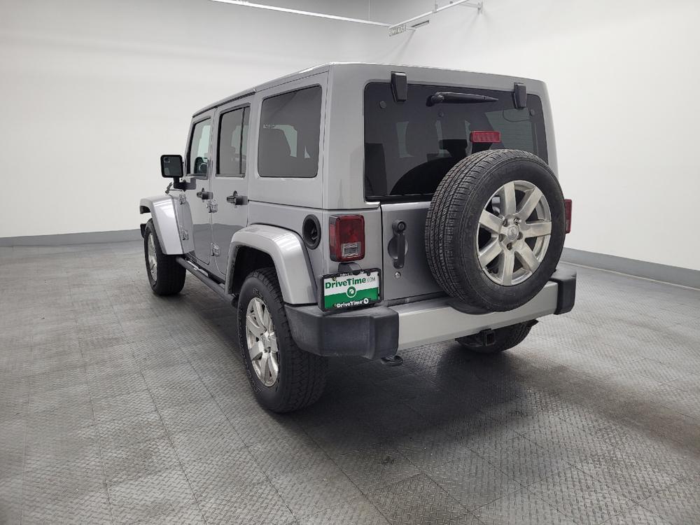 used 2014 Jeep Wrangler Unlimited car, priced at $19,195