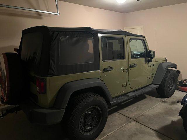 used 2013 Jeep Wrangler Unlimited car, priced at $16,350