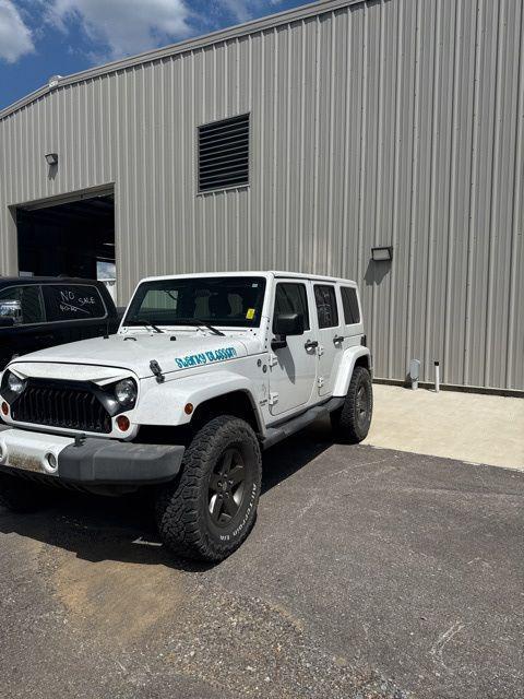 used 2012 Jeep Wrangler Unlimited car, priced at $12,985