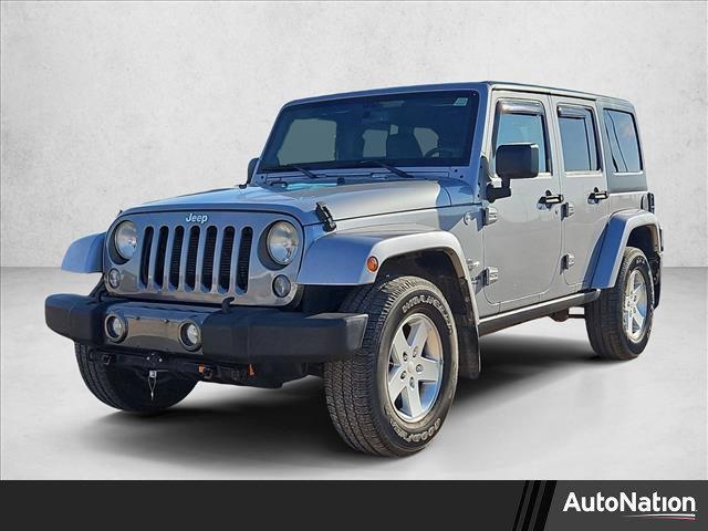 used 2014 Jeep Wrangler Unlimited car, priced at $16,485