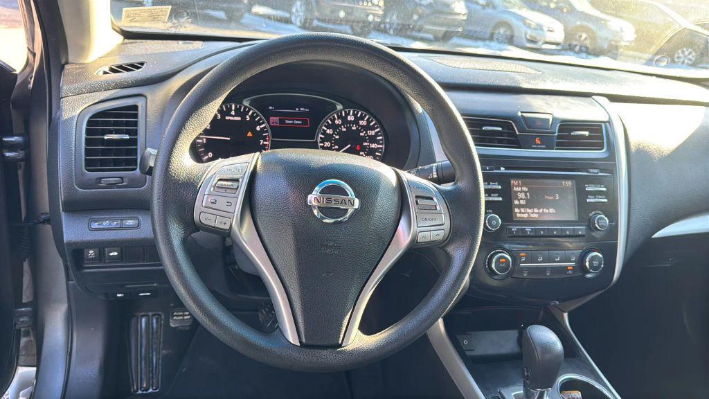 used 2015 Nissan Altima car, priced at $6,995