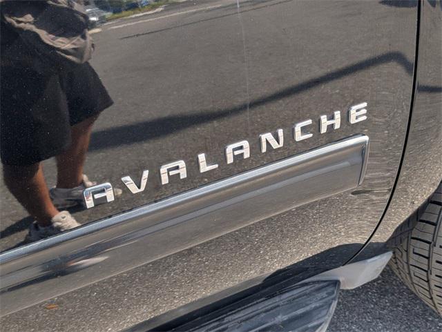 used 2013 Chevrolet Avalanche car, priced at $14,600