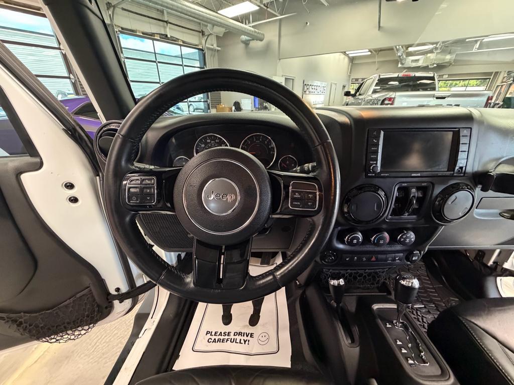 used 2014 Jeep Wrangler Unlimited car, priced at $15,995