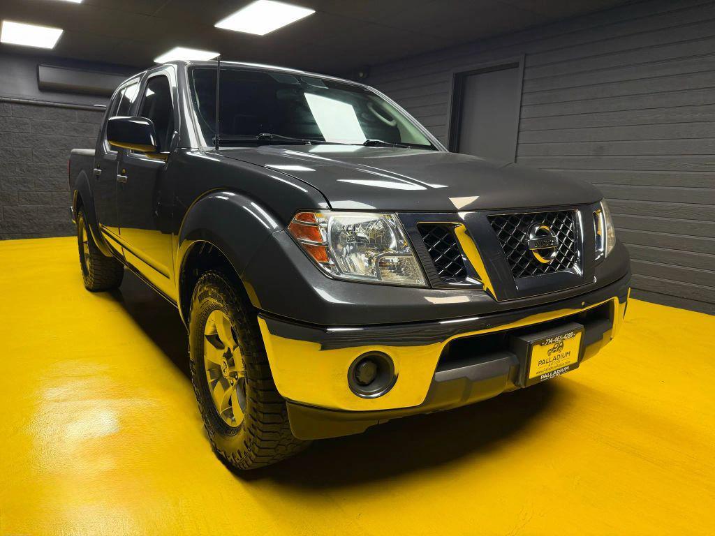used 2010 Nissan Frontier car, priced at $13,500