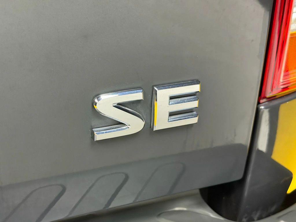 used 2010 Nissan Frontier car, priced at $13,500