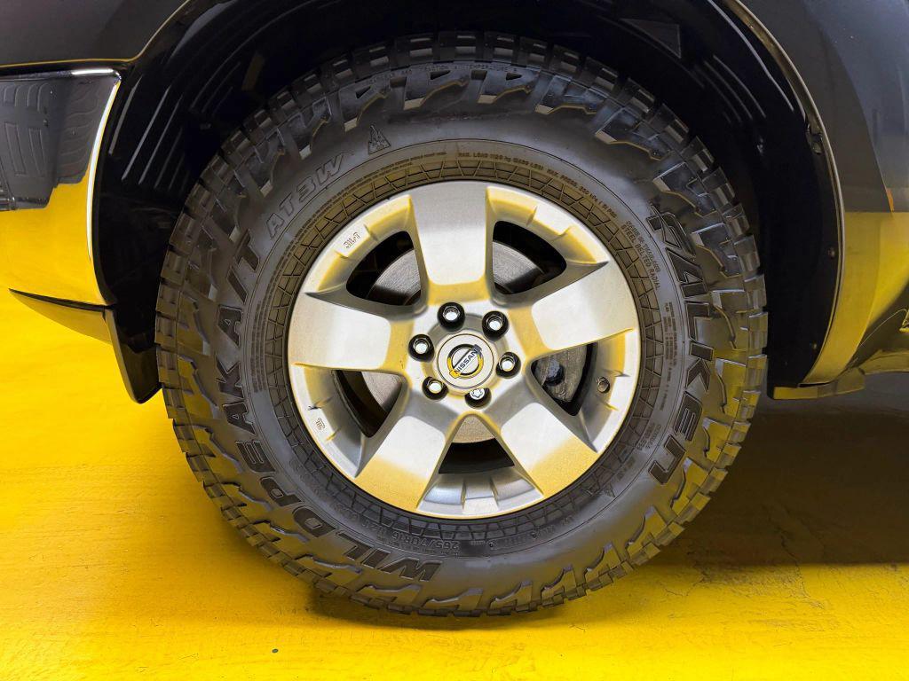 used 2010 Nissan Frontier car, priced at $13,500