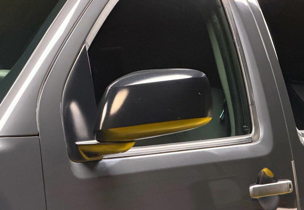 used 2010 Nissan Frontier car, priced at $13,500