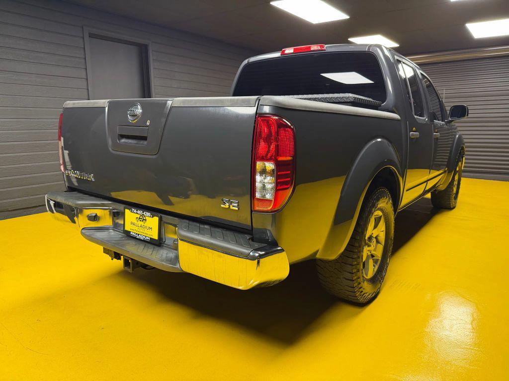 used 2010 Nissan Frontier car, priced at $13,500