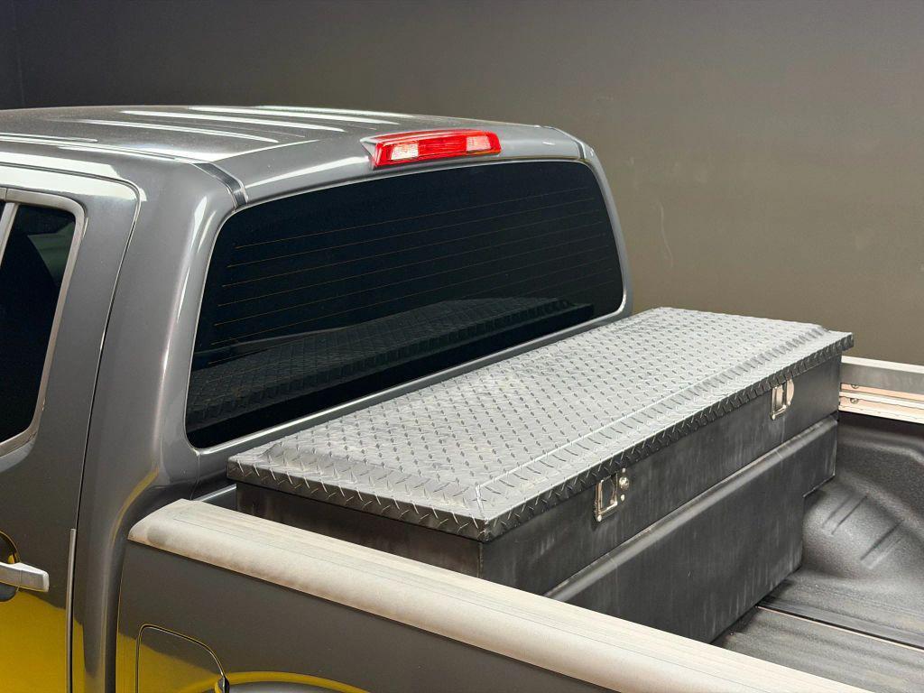 used 2010 Nissan Frontier car, priced at $13,500