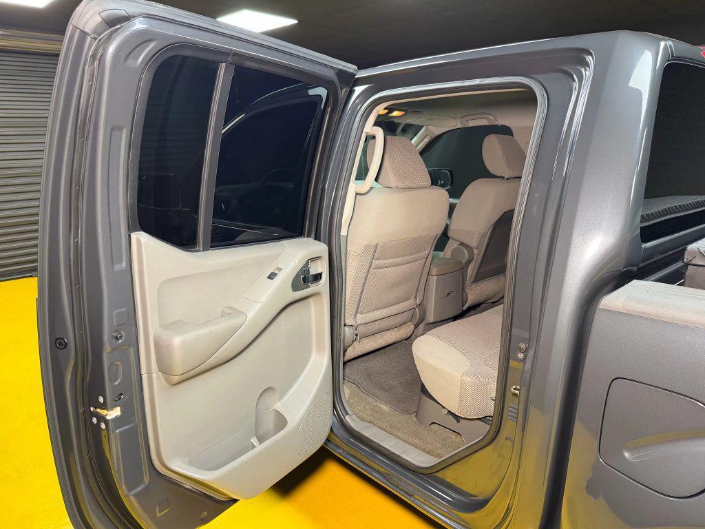 used 2010 Nissan Frontier car, priced at $13,500