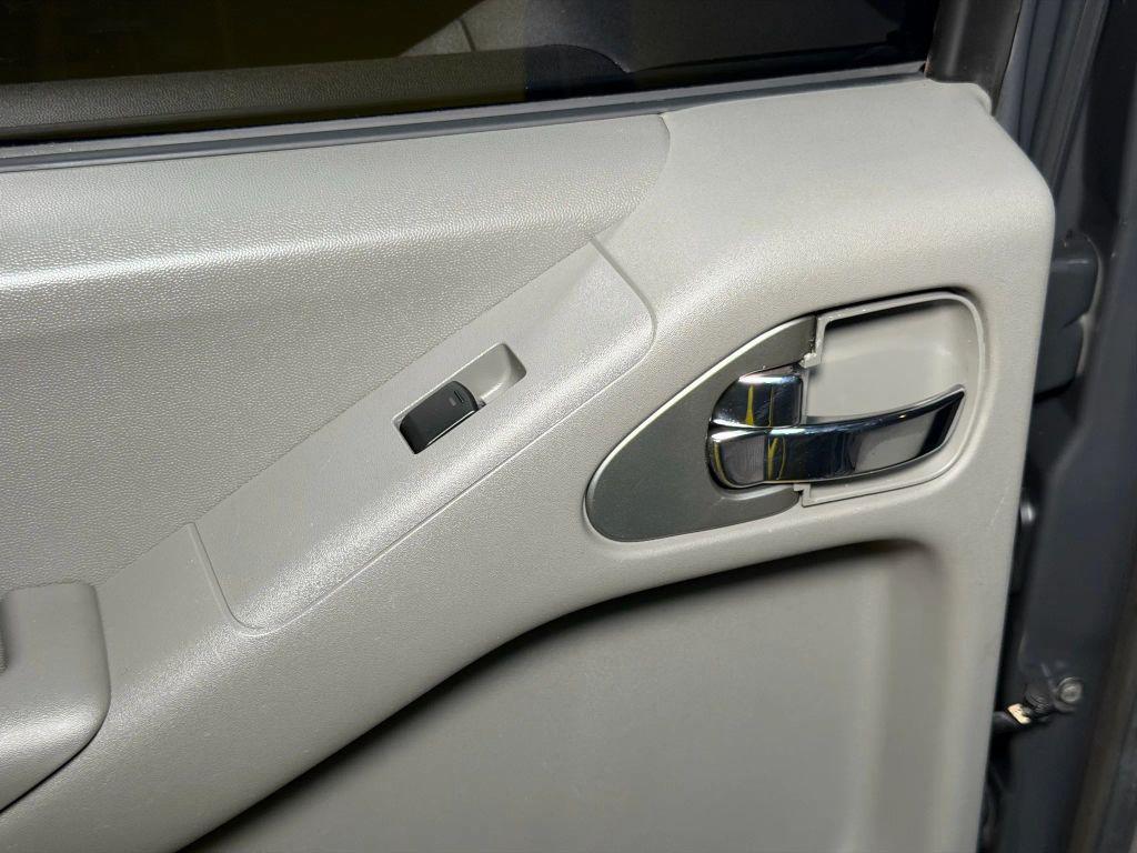 used 2010 Nissan Frontier car, priced at $13,500