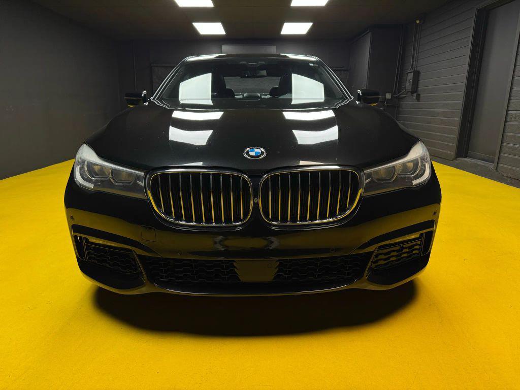 used 2016 BMW 740 car, priced at $16,350