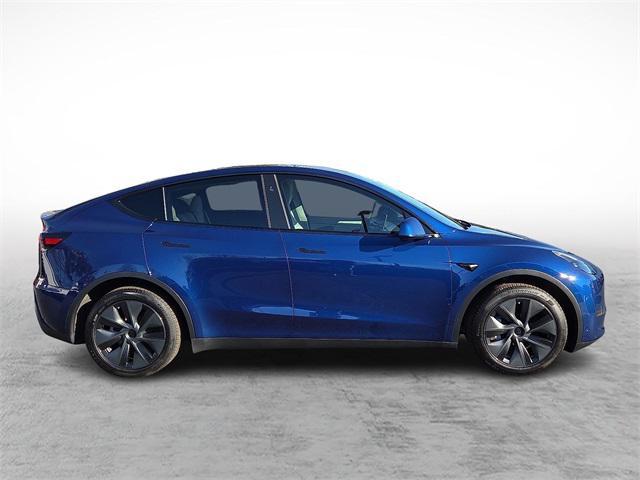 used 2025 Tesla Model Y car, priced at $36,998