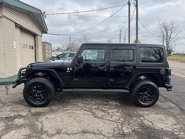 used 2015 Jeep Wrangler Unlimited car, priced at $13,495