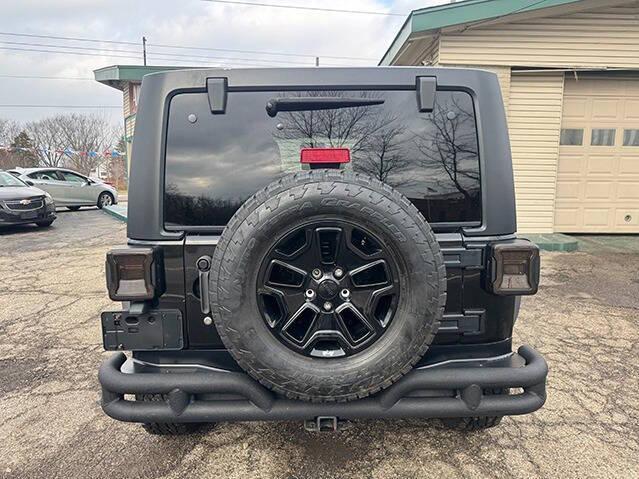 used 2015 Jeep Wrangler Unlimited car, priced at $13,495