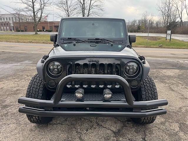 used 2015 Jeep Wrangler Unlimited car, priced at $13,495