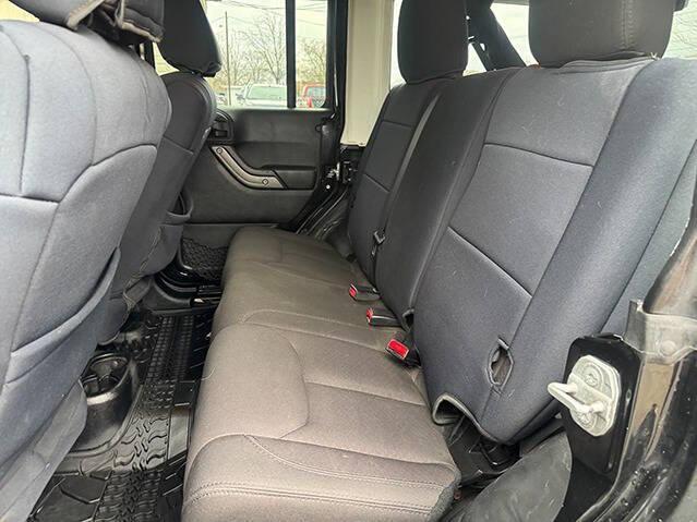 used 2015 Jeep Wrangler Unlimited car, priced at $13,495