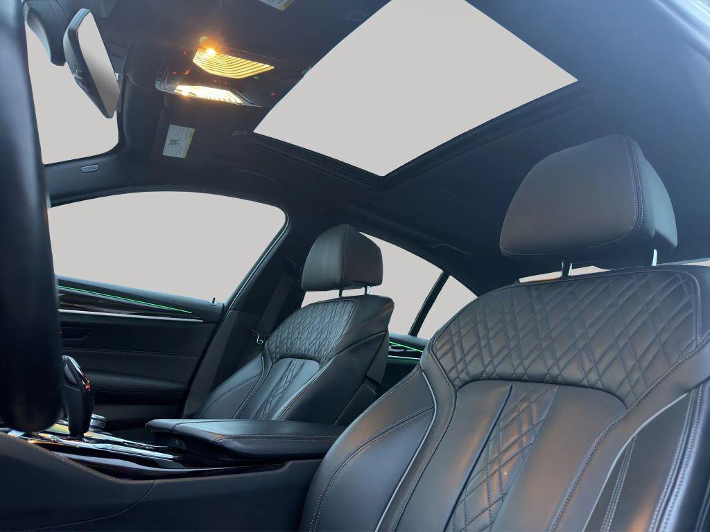 used 2023 BMW M550 car, priced at $61,829