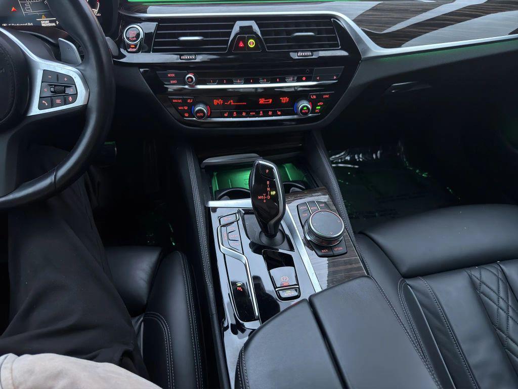 used 2023 BMW M550 car, priced at $61,829