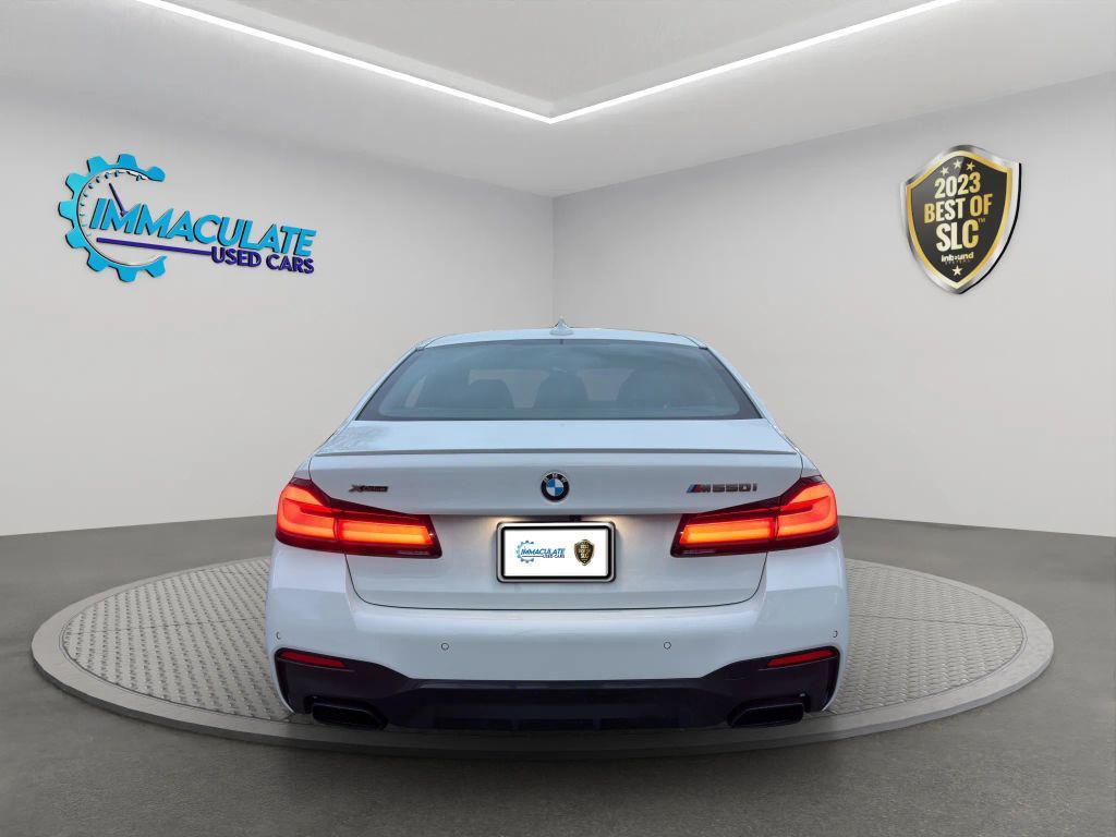 used 2023 BMW M550 car, priced at $61,829