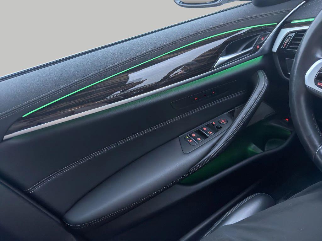 used 2023 BMW M550 car, priced at $61,829