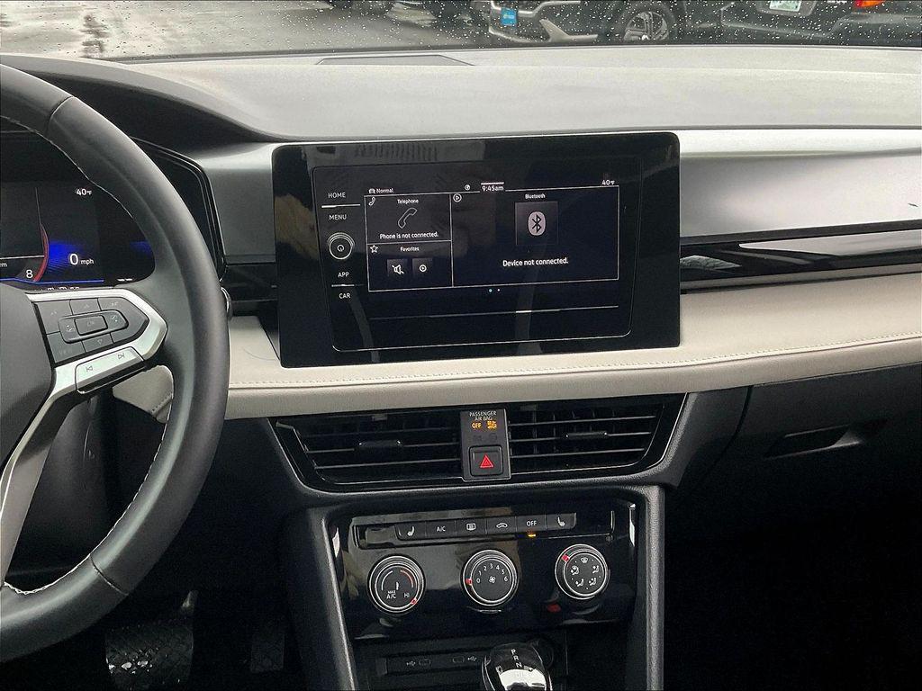 used 2025 Volkswagen Taos car, priced at $23,402