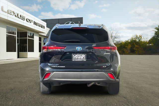 used 2021 Toyota Highlander Hybrid car, priced at $25,598