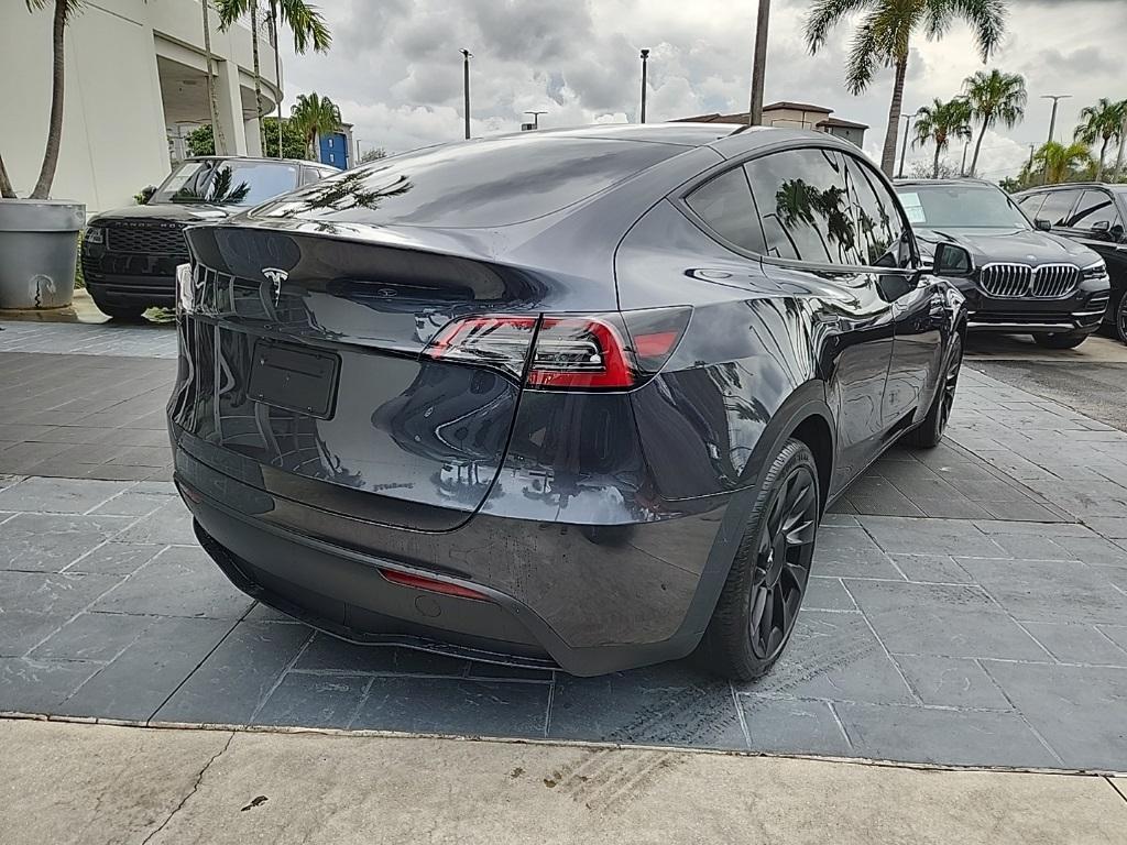 used 2025 Tesla Model Y car, priced at $39,495