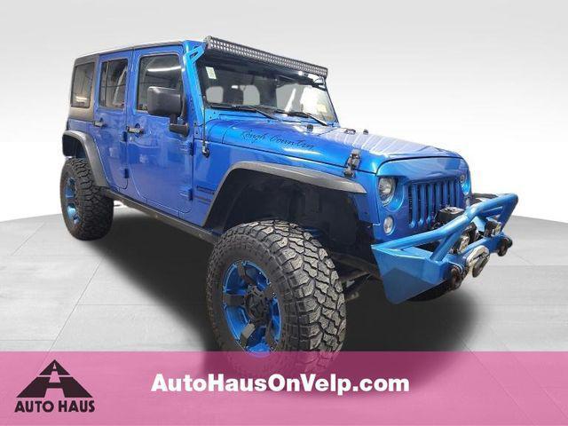 used 2015 Jeep Wrangler Unlimited car, priced at $18,700