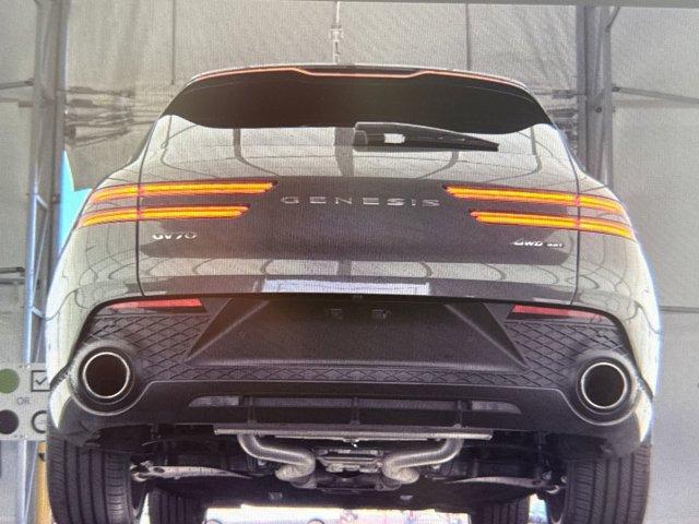 used 2025 Genesis GV70 car, priced at $58,900