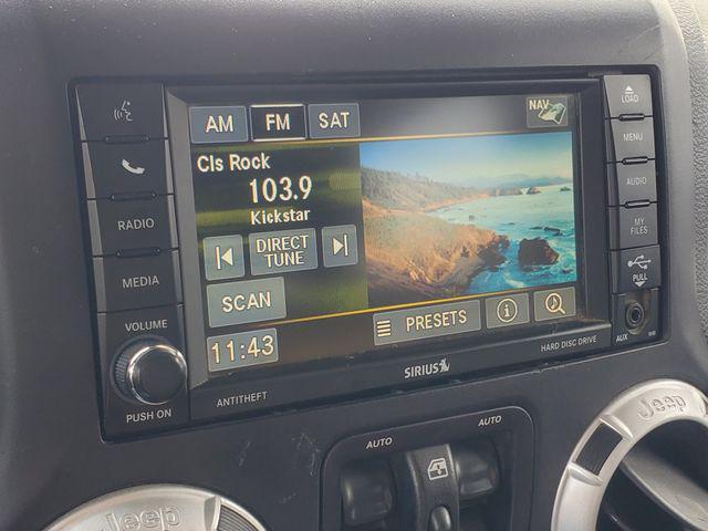 used 2015 Jeep Wrangler Unlimited car, priced at $10,900