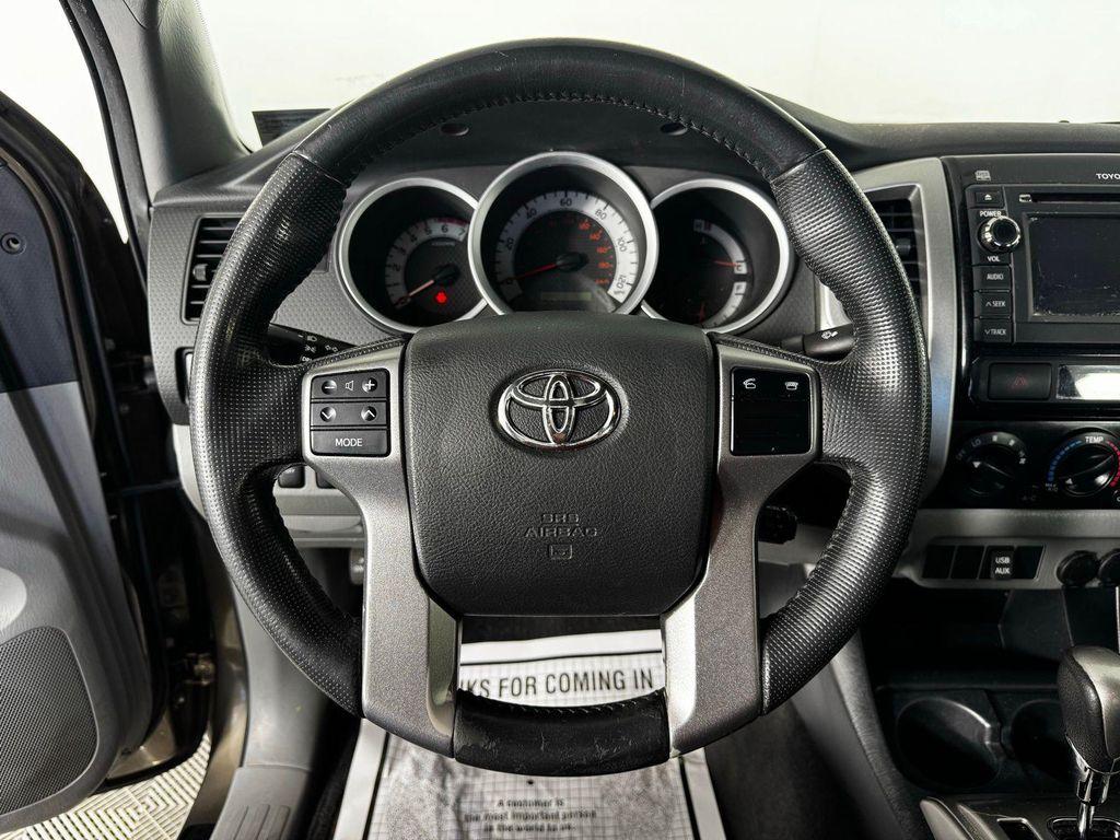 used 2013 Toyota Tacoma car, priced at $13,650