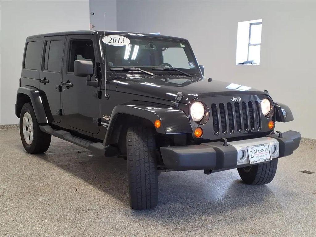 used 2013 Jeep Wrangler Unlimited car, priced at $11,994