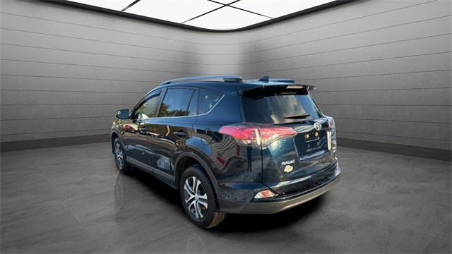 used 2018 Toyota RAV4 car, priced at $14,999