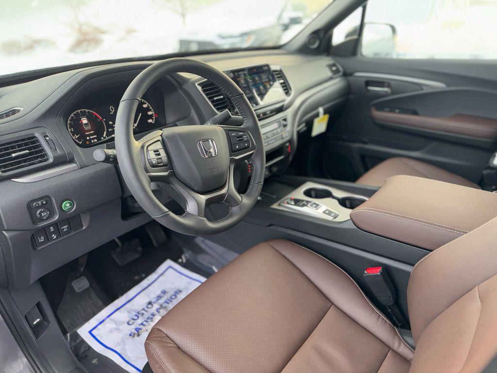 used 2025 Honda Ridgeline car, priced at $36,951