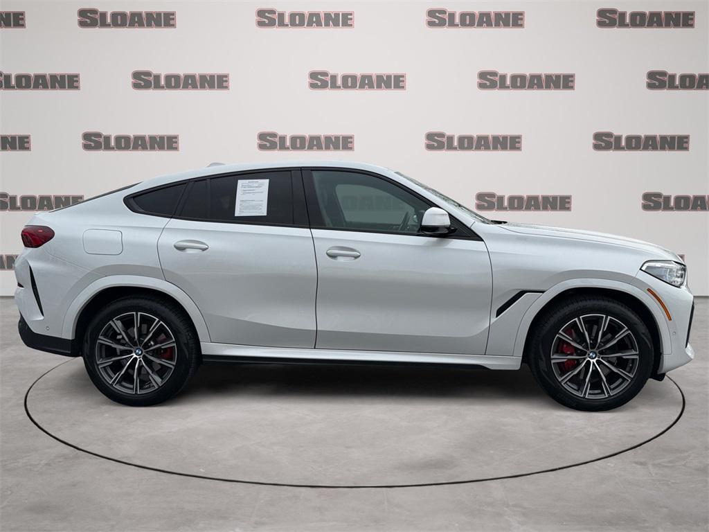 used 2023 BMW X6 car, priced at $53,874