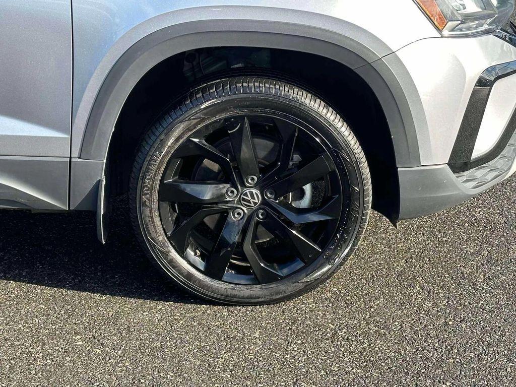 used 2023 Volkswagen Taos car, priced at $16,768