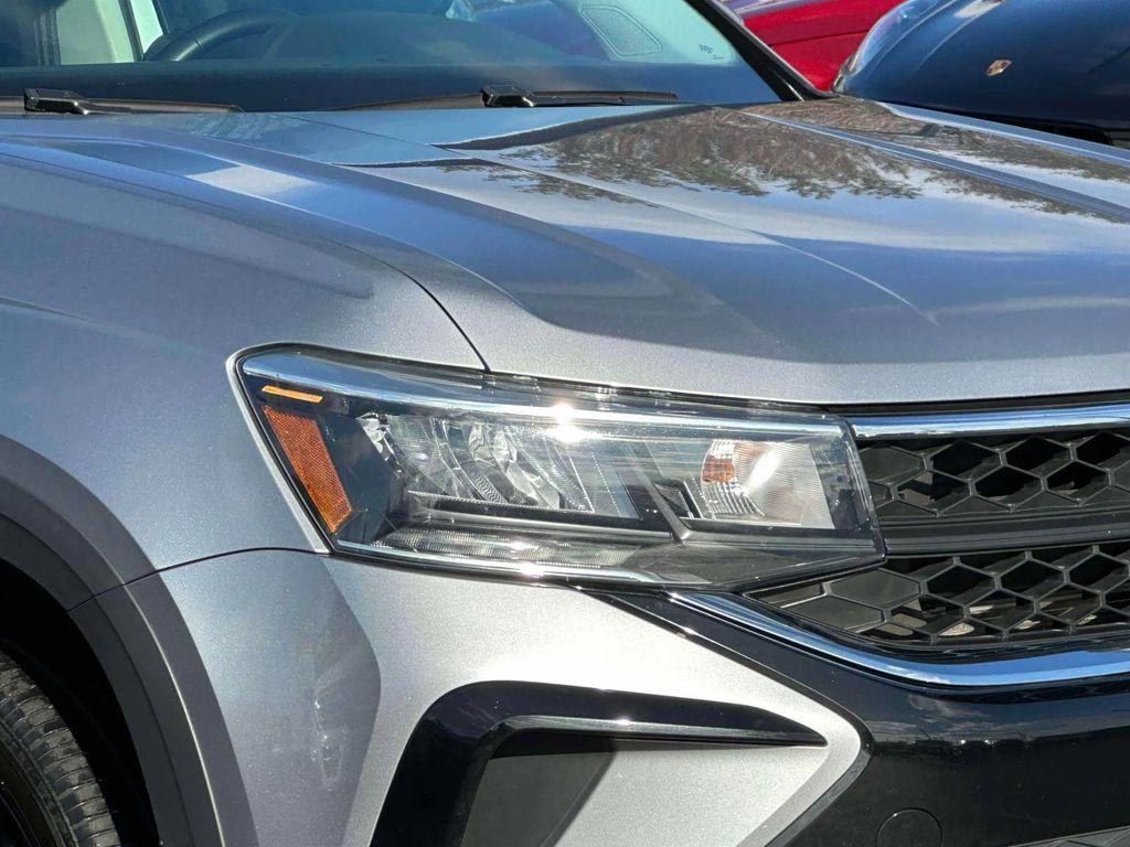 used 2023 Volkswagen Taos car, priced at $16,768