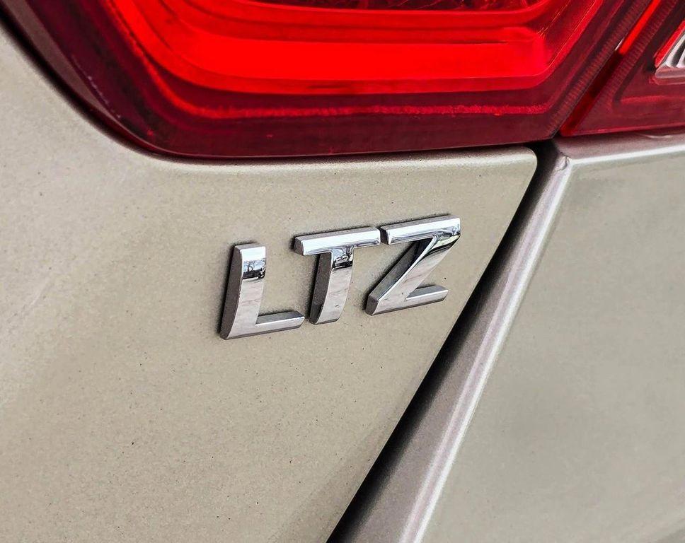 used 2014 Chevrolet Impala car, priced at $13,996